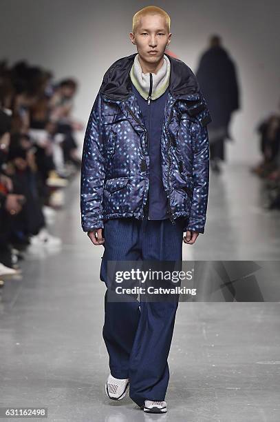 Model walks the runway at the Casely-Hayford Autumn Winter 2017 fashion show during London Menswear Fashion Week on January 7, 2017 in London, United...