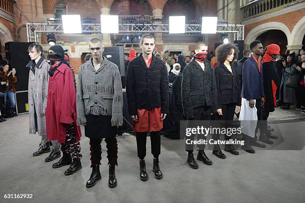 Models pose on the runway at the Agi & Sam Autumn Winter 2017 fashion show during London Menswear Fashion Week on January 7, 2017 in London, United...