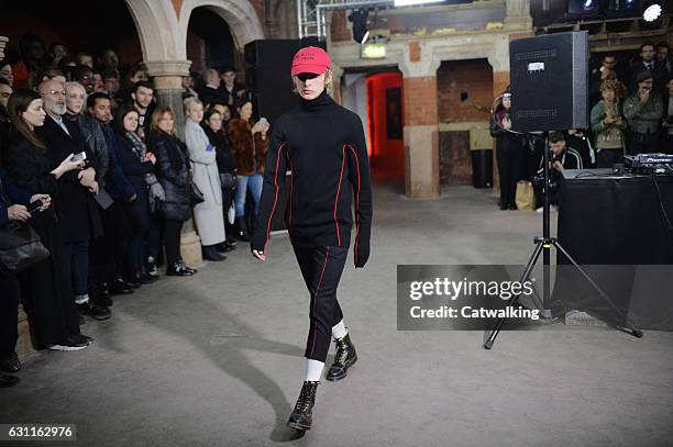 Model walks the runway at the Agi & Sam Autumn Winter 2017 fashion show during London Menswear Fashion Week on January 7, 2017 in London, United...