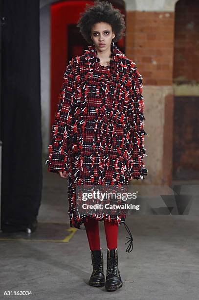 Model walks the runway at the Agi & Sam Autumn Winter 2017 fashion show during London Menswear Fashion Week on January 7, 2017 in London, United...