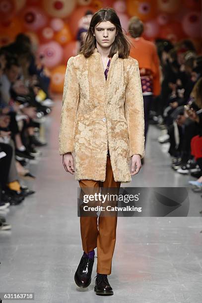 Model walks the runway at the Katie Eary Autumn Winter 2017 fashion show during London Menswear Fashion Week on January 7, 2017 in London, United...