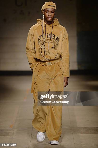 Model walks the runway at the Astrid Andersen Autumn Winter 2017 fashion show during London Menswear Fashion Week on January 7, 2017 in London,...