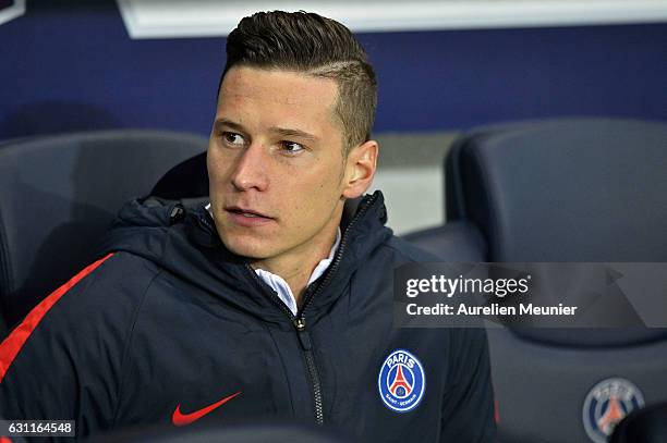 Julian Draxler of Paris Saint-Germain reacts as he seats on the bench at the beginning of the French Cup match between Paris Saint-Germain and SC...