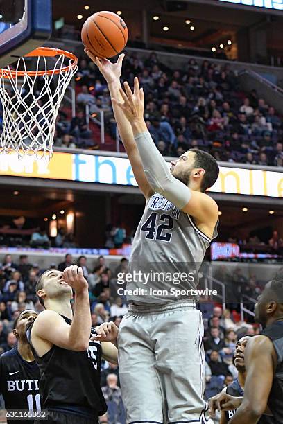 Georgetown Hoyas center Bradley Hayes scores in the second half against Butler Bulldogs forward Andrew Chrabascz on January 7 at the Verizon Center...