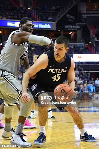 Butler Bulldogs forward Andrew Chrabascz goes to the basket in the first half against Georgetown Hoyas forward Akoy Agau on January 7 at the Verizon...