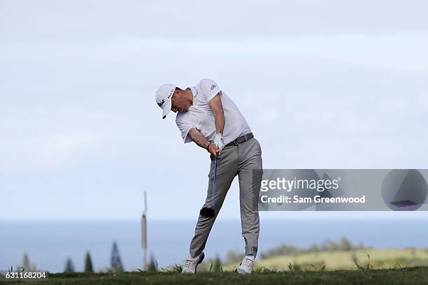 Justin Thomas of the United States plays his shot from the 16th tee during the third round of the SBS Tournament of Champions at the Plantation...