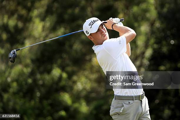 Justin Thomas of the United States plays his shot from the 18th tee during the third round of the SBS Tournament of Champions at the Plantation...