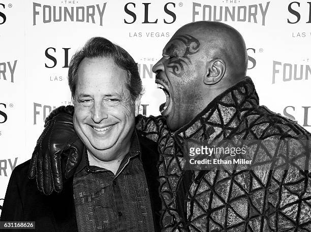 Comedian/actor Jon Lovitz and former boxer Mike Tyson joke around as they arrive at the kickoff of Lovitz's 20-show residency "Reunited" with Dana...