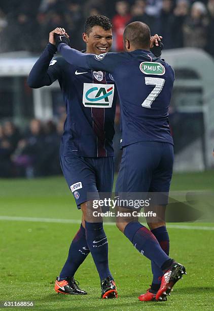 Thiago Silva of PSG celebrates his goal with Lucas Moura during the French Cup match between Paris Saint-Germain and SC Bastia at Parc des Princes on...