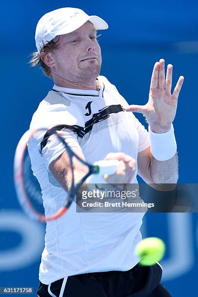 Matthew Barton of Australia plays a forehand shot in his final qualifying match against Mathias Bourgue of France during the 2017 Sydney...