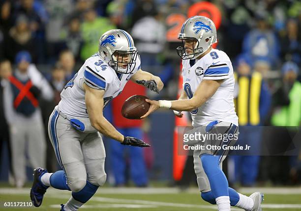 Quarterback Matthew Stafford of the Detroit Lions hands off to running back Zach Zenner against the Seattle Seahawks in the NFC Wild Card game at...
