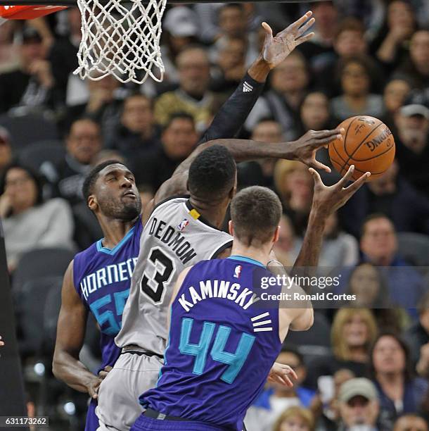 Roy Hibbert of the Charlotte Hornets blocks shot attempt of Dwayne Dedmon of the San Antonio Spurs at AT&T Center on January 7, 2017 in San Antonio,...