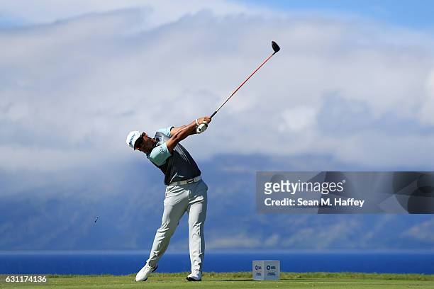 Hideki Matsuyama of Japan plays his shot from the 13th tee during the third round of the SBS Tournament of Champions at the Plantation Course at...