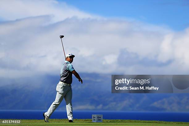 Hideki Matsuyama of Japan plays his shot from the 13th tee during the third round of the SBS Tournament of Champions at the Plantation Course at...