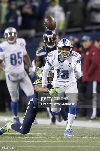 Wide receiver TJ Jones of the Detroit Lions watches as a pass overshoots him against the Seattle Seahawks in the NFC Wild Card game at CenturyLink...