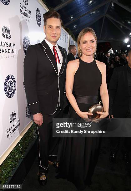 Fashion Director of the H by Halston Cameron Silver and actress Radha Mitchell attend The Art of Elysium presents Stevie Wonder's HEAVEN -...