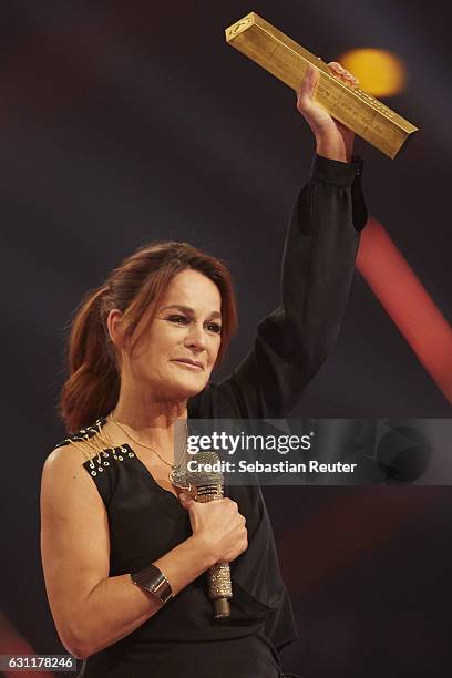 Andrea Berg is seen on stage at the 'Das grosse Fest der Besten' tv show at Velodrom on January 7, 2017 in Berlin, Germany.