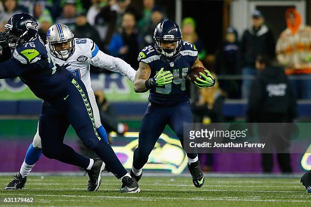 Thomas Rawls of the Seattle Seahawks carries the ball during the second half against the Detroit Lions in the NFC Wild Card game at CenturyLink Field...