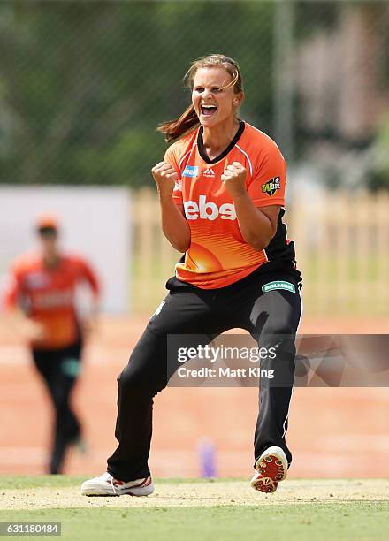 Suzie Bates of the Scorchers celebrates taking the wicket of Sara McGlashan of the Sixers during the Women's Big Bash League match between the Perth...