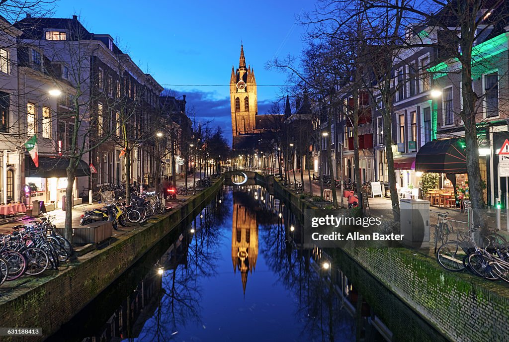 Oude Kerk in Delft illuminated at dusk