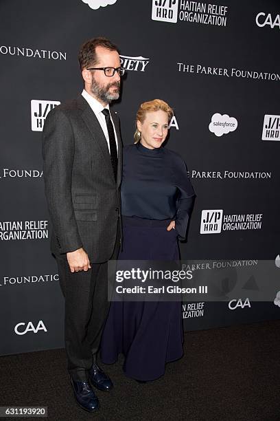 Artist Eric White and actress Patricia Arquette attend the 6th Annual Sean Penn & Friends HAITI RISING Gala Benefiting J/P Haitian Relief...