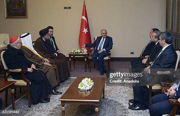 Turkish Prime Minister Binali Yildirim meets chairman of Sunni Endowment, Abdullatif Al-Hamaim, representative of Iraqi Shia leader Ayatollah Ali...