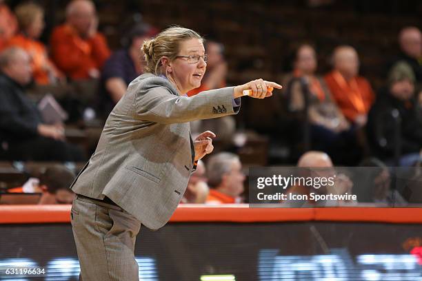 Bowling Green head coach Jennifer Roos shouts instructions to her players during a regular season basketball game between the Northern Illinois...