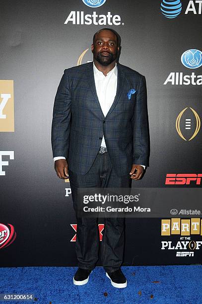 Former football player Brentson Buckner poses on the blue carpet during the Allstate Party At The Playoff on January 7, 2017 in Tampa, Florida.