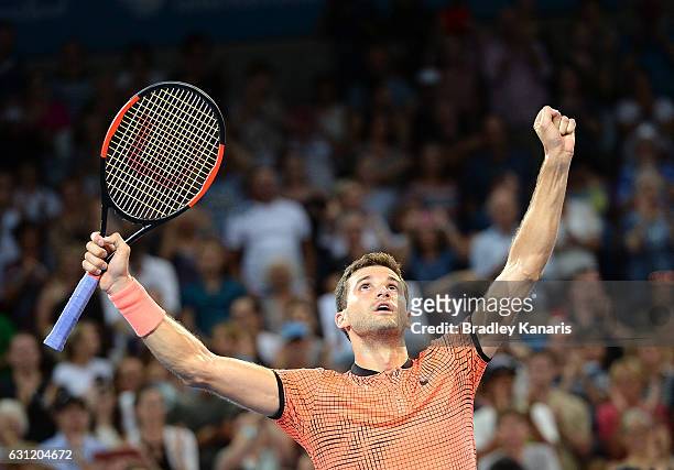 Grigor Dimitrov of Bulgaria celebrates victory against Kei Nishikori of Japan after the Men's Final on day eight of the 2017 Brisbane International...