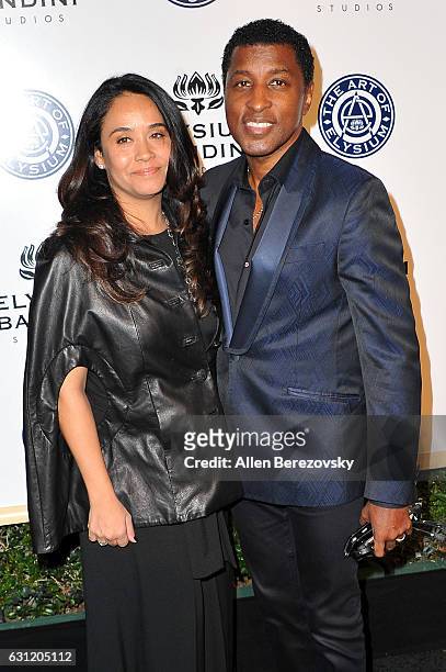 Singer/songwriter Kenny "Babyface" Edmonds and Nicole Pantenburg attend Stevie Wonder's HEAVEN 10th Anniversary celebration presented by The Art of...