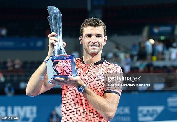 Grigor Dimitrov of Bulgaria celebrates victory against Kei Nishikori of Japan after the Men's Final on day eight of the 2017 Brisbane International...