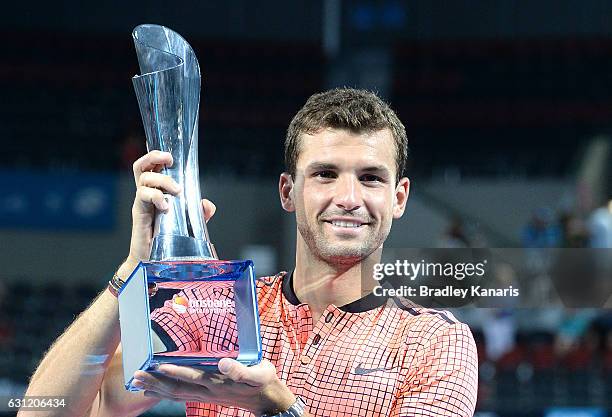 Grigor Dimitrov of Bulgaria celebrates victory against Kei Nishikori of Japan after the Men's Final on day eight of the 2017 Brisbane International...