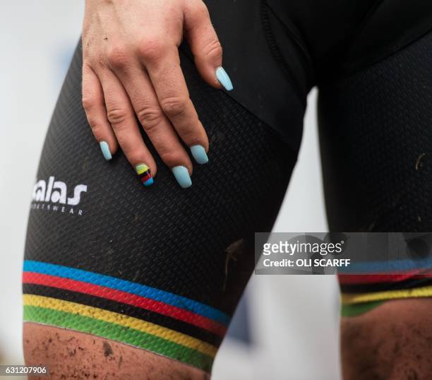 Evie Richards, the Under-23 cyclo-cross world champion, displays nails painted in the colours of the UCI world champion after winning the Under-23...
