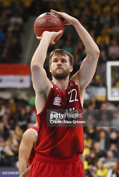 Danilo Barthel of Muenchen shoots a free throw during the easyCredit BBL match between MHP Riesen Ludwigsburg and FC Bayern Muenchen at MHP Arena on...