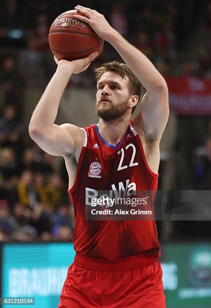 Danilo Barthel of Muenchen shoots a free throw during the easyCredit BBL match between MHP Riesen Ludwigsburg and FC Bayern Muenchen at MHP Arena on...