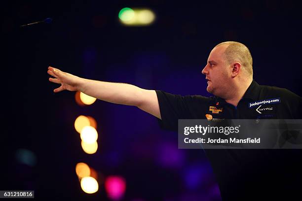 Ryan Joyce of England throws during his Men's First Round match against Martin Adams of England on Day Two of the BDO Lakeside World Professional...