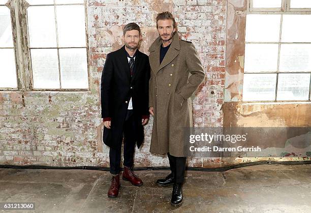 Kent & Curwen Creative Director Daniel Kearns and David Beckham attend the launch of the Kent & Curwen collection during London Fashion Week Men's...