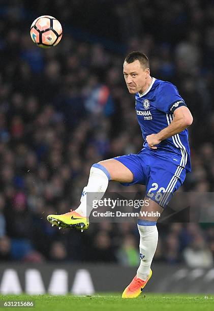 John Terry of Chelsea in action during The Emirates FA Cup Third Round match between Chelsea and Peterborough United at Stamford Bridge on January 8,...