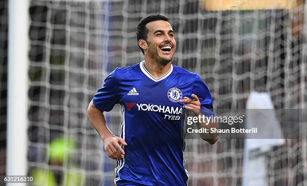 Pedro of Chelsea celebrates scoring his sides first goal during The Emirates FA Cup Third Round match between Chelsea and Peterborough United at...