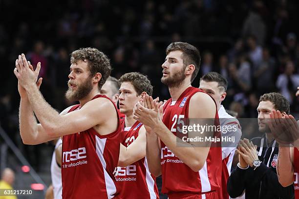 Players of Brose Bamberg celebrate after the BBL Bundesliga match between Telekom Baskets Bonn and Brose Bamberg at Telekom Dome on January 8, 2017...