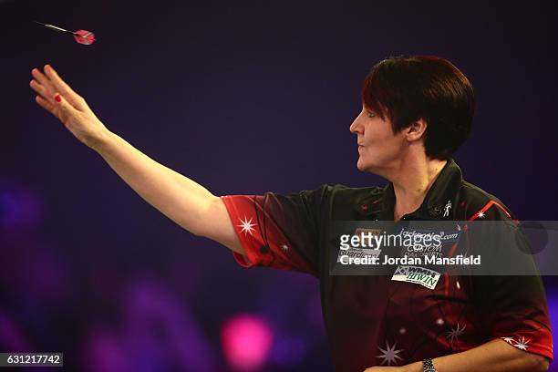 Lisa Ashton of England throws during her Women's First Round match against Sharon Prins of the Netherlands on Day Two of the BDO Lakeside World...