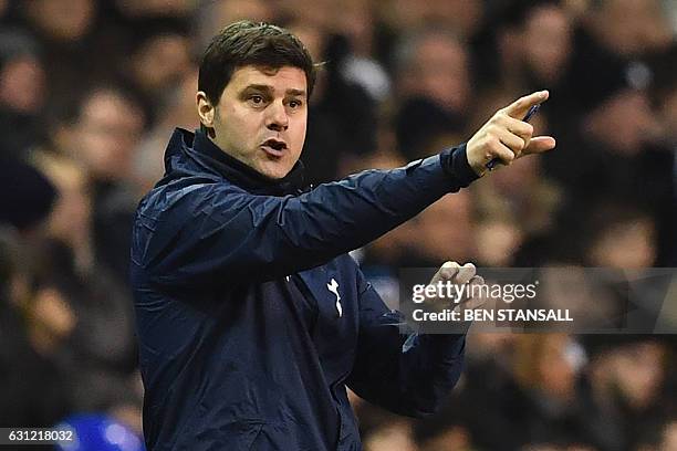 Tottenham Hotspur's Argentinian head coach Mauricio Pochettino gestures on the touchline during the English FA Cup third round football match between...