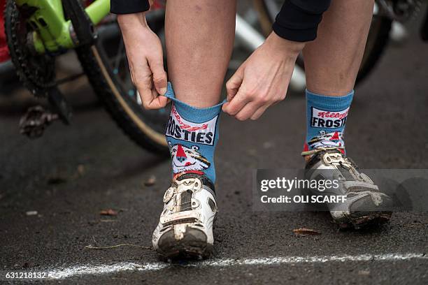Rider pulls up her novelty "Frosties" socks before competing in the Elite Women's Championship on the second day of the 2017 British Cycling National...