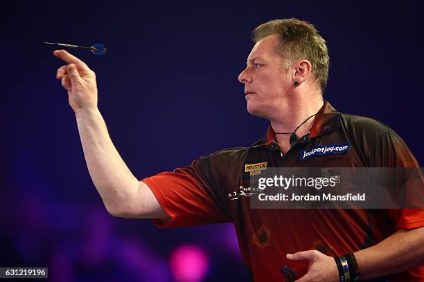 Mark McGrath of New Zealand throws during his Men's First Round match against Scott Mitchell of England on Day Two of the BDO Lakeside World...