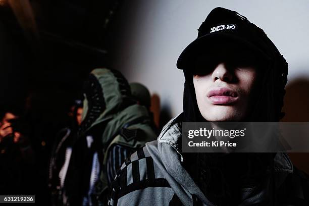 Models backstage ahead of the KTZ show during London Fashion Week Men's January 2017 collections at BFC Show Space on January 8, 2017 in London,...