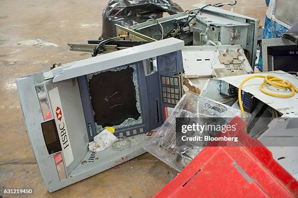 An HSBC Holdings Plc automated teller machine lays destroyed inside a Grupo Comercial Chedraui SA store after looting in Veracruz City, Mexico, on...