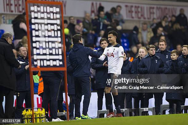 Tottenham Hotspur's Dele Alli is congratulated by Tottenham Hotspur manager Mauricio Pochettino at full time of the Emirates FA Cup Third Round match...