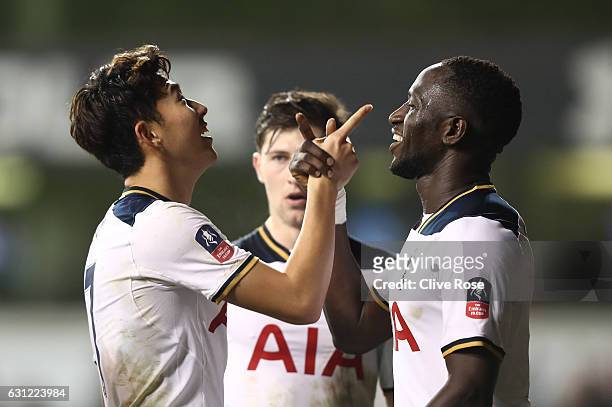 Heung-Min Son of Tottenham Hotspur celebrates scoring his sides second goal with Moussa Sissoko of Tottenham Hotspur during The Emirates FA Cup Third...