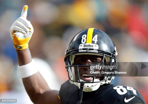 Antonio Brown of the Pittsburgh Steelers celebrates after scoring his second touchdown during the first quarter against the Miami Dolphins in the AFC...