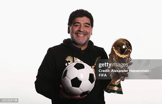 Diego Maradona of Argentina poses with the FIFA World Cup trophy prior to The Best FIFA Football Awards at Kameha Zurich Hotel on January 8, 2017 in...